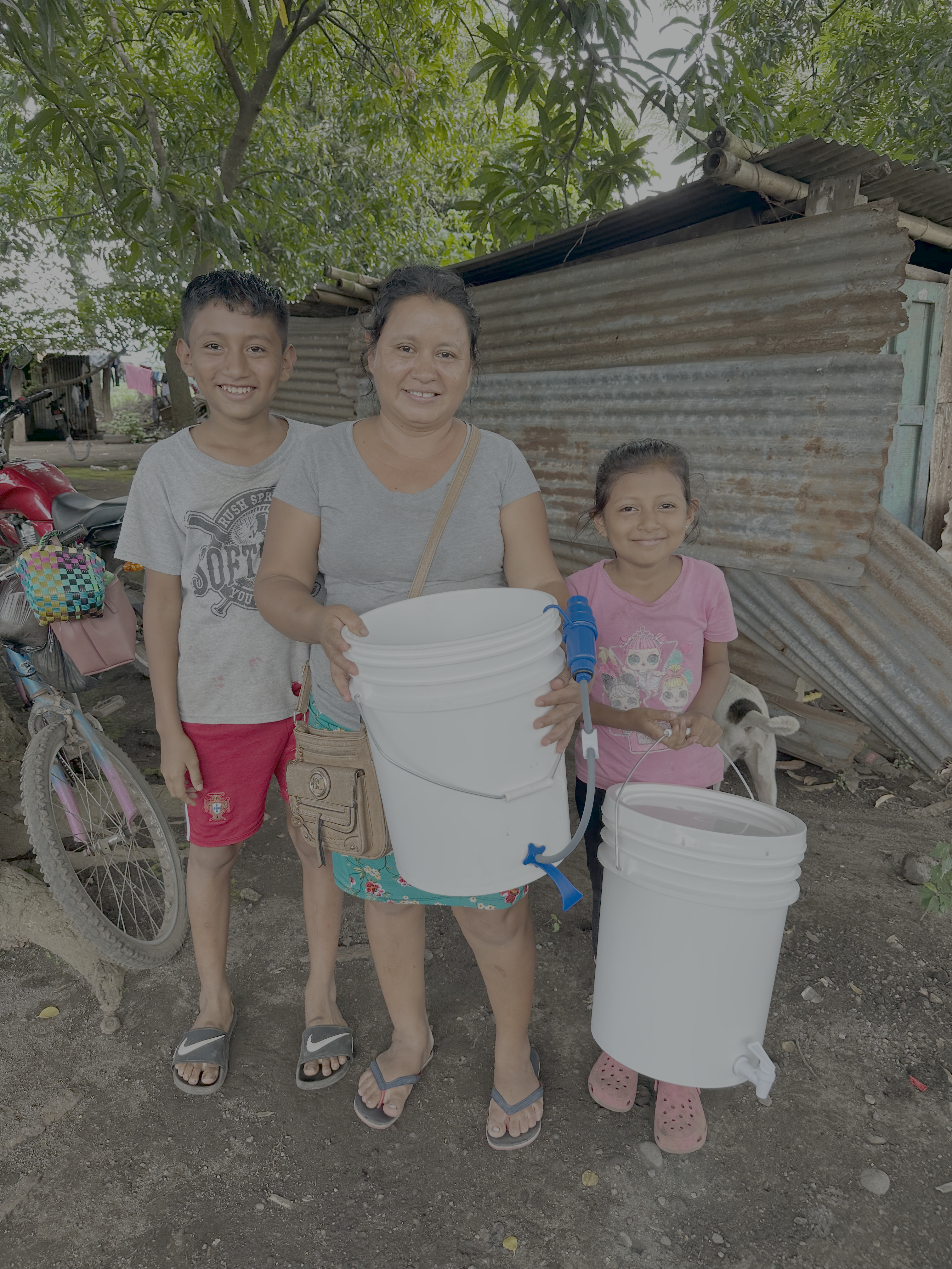 Family receiving clean water in Guatemala